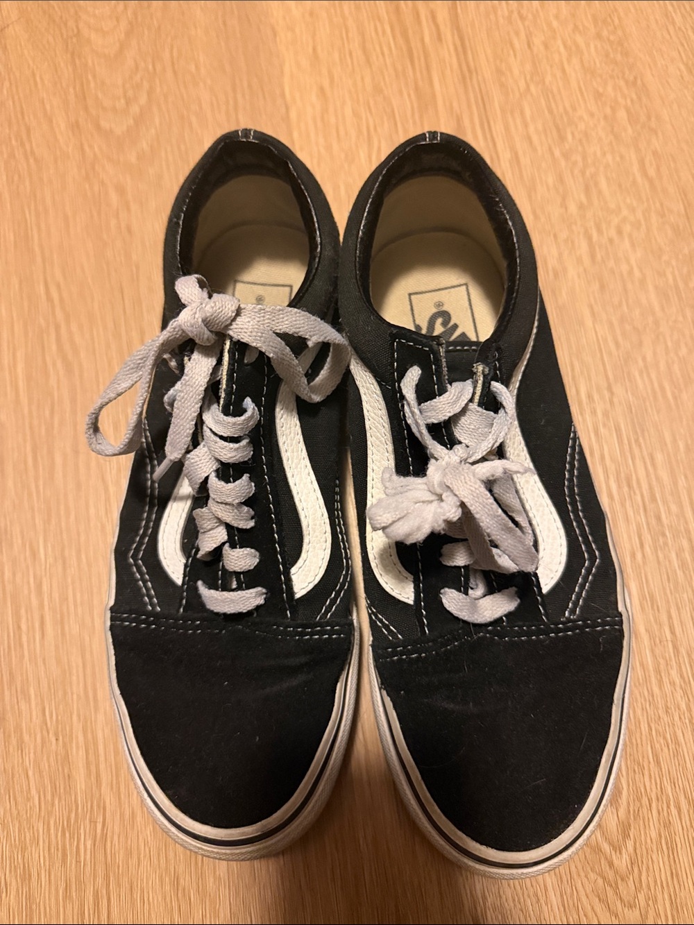 Vans women’s Black and White Low-Top Skate Sneakers